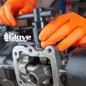 Disposable Gloves in use mechanics gear box.